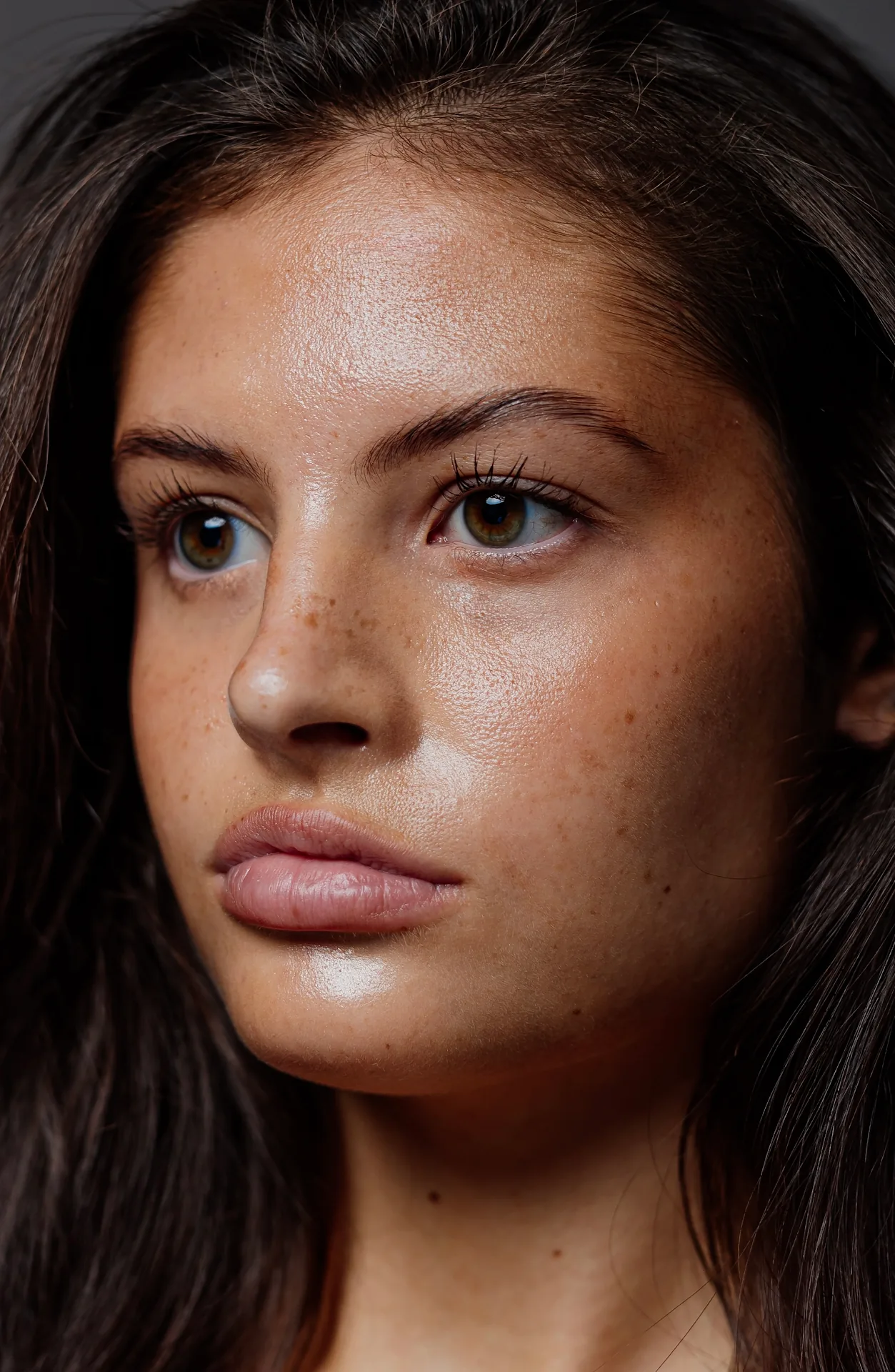 Close-up portrait with dark background